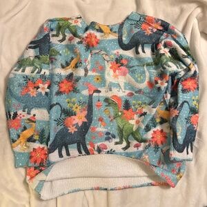 Dinosaur Christmas sweater.
